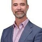 Albert J Delgado